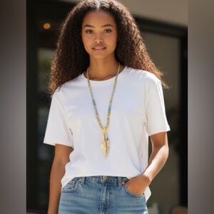 Free People Ariana Ost The Era Strand Necklace, floral fabric shell pendant.